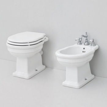 Sanitari hermitage distanziati da parete scarico a terra cm. 55x36 con sedile softclose in noce massello di Art Ceram